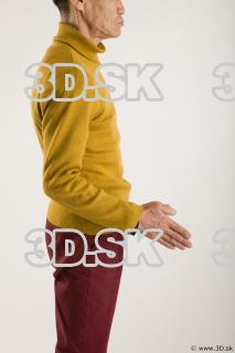 Arm flexing reference of yellow sweater red trousers Sidney 0012